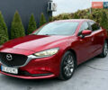 Красный Мазда 6, объемом двигателя 2 л и пробегом 121 тыс. км за 17999 $, фото 1 на Automoto.ua