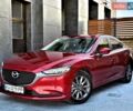 Красный Мазда 6, объемом двигателя 2 л и пробегом 125 тыс. км за 17900 $, фото 1 на Automoto.ua