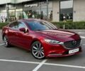 Красный Мазда 6, объемом двигателя 2.49 л и пробегом 120 тыс. км за 17990 $, фото 1 на Automoto.ua