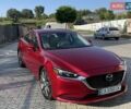 Красный Мазда 6, объемом двигателя 2.49 л и пробегом 141 тыс. км за 19000 $, фото 1 на Automoto.ua