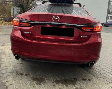 Красный Мазда 6, объемом двигателя 2.5 л и пробегом 99 тыс. км за 13000 $, фото 4 на Automoto.ua