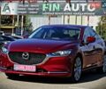Красный Мазда 6, объемом двигателя 2.5 л и пробегом 118 тыс. км за 18800 $, фото 1 на Automoto.ua