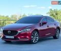Красный Мазда 6, объемом двигателя 2.49 л и пробегом 90 тыс. км за 18999 $, фото 1 на Automoto.ua