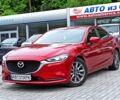 Красный Мазда 6, объемом двигателя 2 л и пробегом 117 тыс. км за 18900 $, фото 1 на Automoto.ua