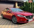Красный Мазда 6, объемом двигателя 2.49 л и пробегом 98 тыс. км за 18850 $, фото 1 на Automoto.ua