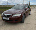 Красный Мазда 6, объемом двигателя 1.8 л и пробегом 328 тыс. км за 3900 $, фото 1 на Automoto.ua