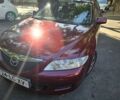 Красный Мазда 6, объемом двигателя 2 л и пробегом 303 тыс. км за 1750 $, фото 1 на Automoto.ua