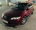 Красный Мазда 6, объемом двигателя 2 л и пробегом 300 тыс. км за 2100 $, фото 1 на Automoto.ua
