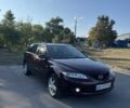 Красный Мазда 6, объемом двигателя 2 л и пробегом 267 тыс. км за 3750 $, фото 1 на Automoto.ua