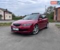 Красный Мазда 6, объемом двигателя 2 л и пробегом 370 тыс. км за 5700 $, фото 1 на Automoto.ua