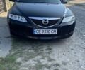 Красный Мазда 6, объемом двигателя 1.8 л и пробегом 350 тыс. км за 3850 $, фото 1 на Automoto.ua