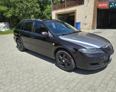 Красный Мазда 6, объемом двигателя 2 л и пробегом 237 тыс. км за 4400 $, фото 2 на Automoto.ua