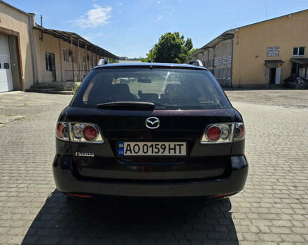 Красный Мазда 6, объемом двигателя 2 л и пробегом 237 тыс. км за 4400 $, фото 4 на Automoto.ua