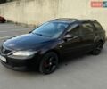 Красный Мазда 6, объемом двигателя 2 л и пробегом 237 тыс. км за 3500 $, фото 1 на Automoto.ua