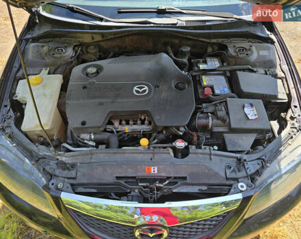 Красный Мазда 6, объемом двигателя 2 л и пробегом 237 тыс. км за 4400 $, фото 11 на Automoto.ua