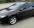 Красный Мазда 6, объемом двигателя 2 л и пробегом 268 тыс. км за 4650 $, фото 1 на Automoto.ua