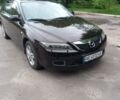 Красный Мазда 6, объемом двигателя 2 л и пробегом 229 тыс. км за 5500 $, фото 1 на Automoto.ua