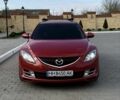 Красный Мазда 6, объемом двигателя 2 л и пробегом 262 тыс. км за 7600 $, фото 1 на Automoto.ua