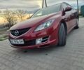 Красный Мазда 6, объемом двигателя 2 л и пробегом 295 тыс. км за 6200 $, фото 1 на Automoto.ua