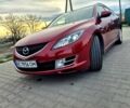 Красный Мазда 6, объемом двигателя 2 л и пробегом 294 тыс. км за 6999 $, фото 1 на Automoto.ua