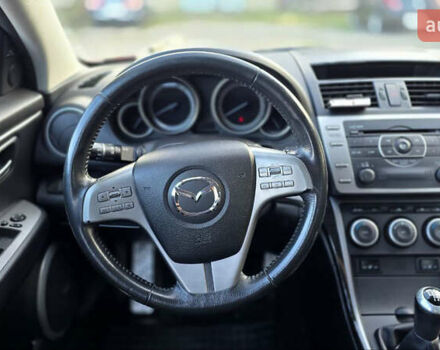 Красный Мазда 6, объемом двигателя 2.18 л и пробегом 440 тыс. км за 6750 $, фото 4 на Automoto.ua