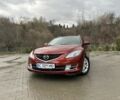 Красный Мазда 6, объемом двигателя 2.2 л и пробегом 245 тыс. км за 6700 $, фото 1 на Automoto.ua