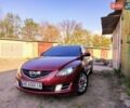 Красный Мазда 6, объемом двигателя 2.18 л и пробегом 311 тыс. км за 6999 $, фото 1 на Automoto.ua