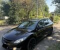 Красный Мазда 6, объемом двигателя 2 л и пробегом 200 тыс. км за 3999 $, фото 1 на Automoto.ua