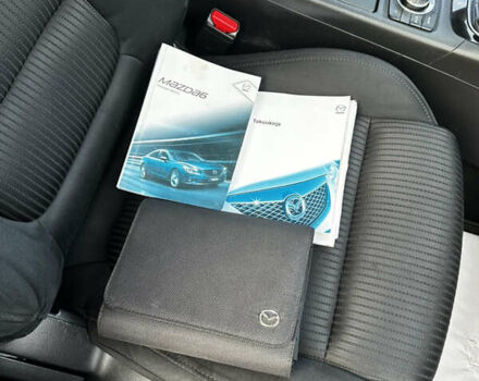 Червоний Мазда 6, об'ємом двигуна 2.18 л та пробігом 287 тис. км за 9777 $, фото 48 на Automoto.ua