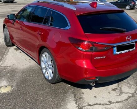 Красный Мазда 6, объемом двигателя 2 л и пробегом 275 тыс. км за 10100 $, фото 1 на Automoto.ua
