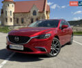Красный Мазда 6, объемом двигателя 2.2 л и пробегом 267 тыс. км за 12500 $, фото 1 на Automoto.ua