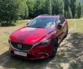 Красный Мазда 6, объемом двигателя 2.19 л и пробегом 229 тыс. км за 15500 $, фото 1 на Automoto.ua