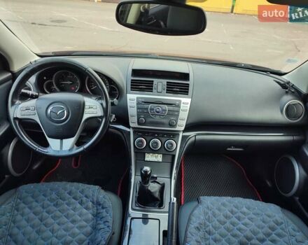 Красный Мазда 6, объемом двигателя 2.18 л и пробегом 231 тыс. км за 5650 $, фото 4 на Automoto.ua