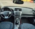 Красный Мазда 6, объемом двигателя 2.18 л и пробегом 231 тыс. км за 5650 $, фото 4 на Automoto.ua