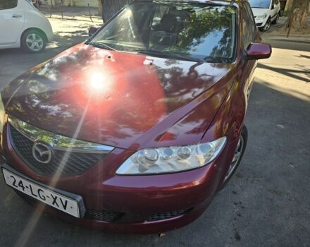 Червоний Мазда 6, об'ємом двигуна 2 л та пробігом 303 тис. км за 1750 $, фото 1 на Automoto.ua