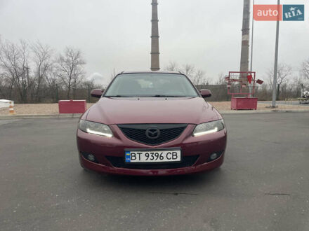 Красный Мазда 6, объемом двигателя 2 л и пробегом 220 тыс. км за 5000 $, фото 1 на Automoto.ua