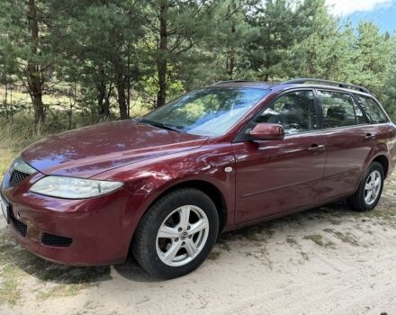 Красный Мазда 6, объемом двигателя 2 л и пробегом 245 тыс. км за 2951 $, фото 1 на Automoto.ua