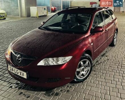 Красный Мазда 6, объемом двигателя 2 л и пробегом 300 тыс. км за 2100 $, фото 1 на Automoto.ua
