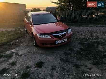 Красный Мазда 6, объемом двигателя 2 л и пробегом 306 тыс. км за 4900 $, фото 1 на Automoto.ua