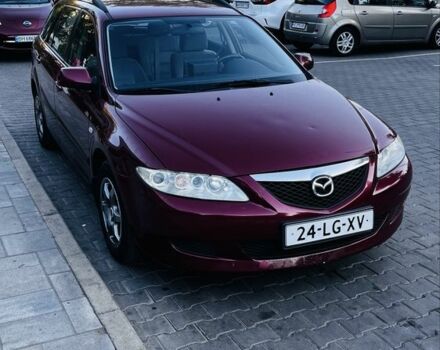 Красный Мазда 6, объемом двигателя 2 л и пробегом 320 тыс. км за 2099 $, фото 1 на Automoto.ua