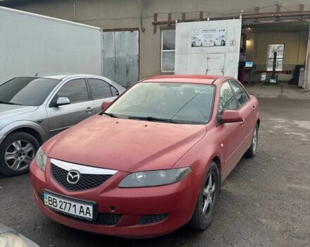 Красный Мазда 6, объемом двигателя 2 л и пробегом 383 тыс. км за 2800 $, фото 1 на Automoto.ua