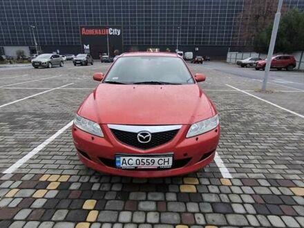 Красный Мазда 6, объемом двигателя 2 л и пробегом 248 тыс. км за 3900 $, фото 1 на Automoto.ua