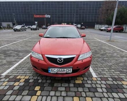 Красный Мазда 6, объемом двигателя 2 л и пробегом 248 тыс. км за 3900 $, фото 1 на Automoto.ua