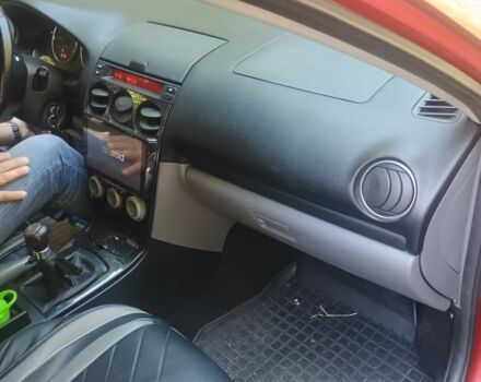 Красный Мазда 6, объемом двигателя 2 л и пробегом 334 тыс. км за 4700 $, фото 1 на Automoto.ua