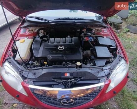 Красный Мазда 6, объемом двигателя 2 л и пробегом 255 тыс. км за 3200 $, фото 1 на Automoto.ua