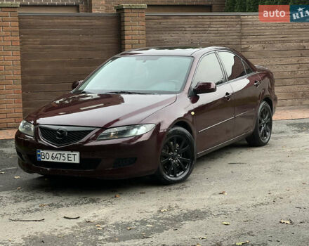Красный Мазда 6, объемом двигателя 2.3 л и пробегом 250 тыс. км за 4400 $, фото 1 на Automoto.ua