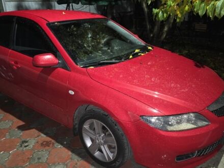 Красный Мазда 6, объемом двигателя 2 л и пробегом 193 тыс. км за 6500 $, фото 1 на Automoto.ua
