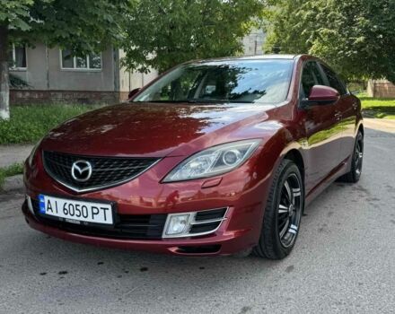 Красный Мазда 6, объемом двигателя 2 л и пробегом 254 тыс. км за 6488 $, фото 1 на Automoto.ua