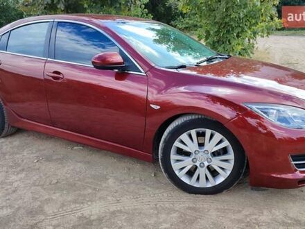 Красный Мазда 6, объемом двигателя 2 л и пробегом 189 тыс. км за 6200 $, фото 1 на Automoto.ua