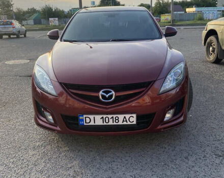 Красный Мазда 6, объемом двигателя 2.49 л и пробегом 230 тыс. км за 6150 $, фото 1 на Automoto.ua